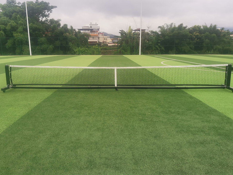 Portable pickleball net with metal poles